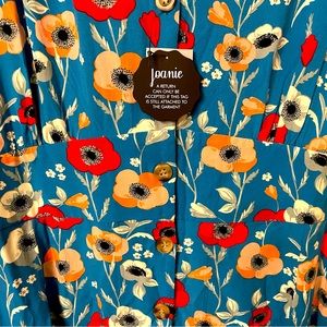 Colorful, comfortable day dress with front button closure.